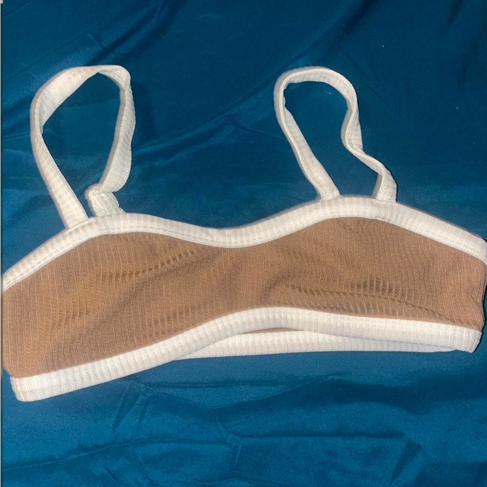 Cropped going out top